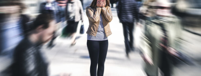 woman with anxiety in public place