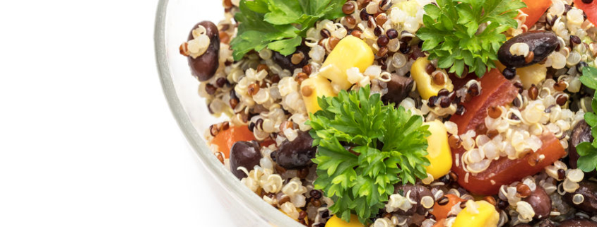 quinoa and black bean salad in clear bowl