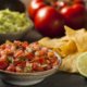 fresh salsa with lentils and chips on the side