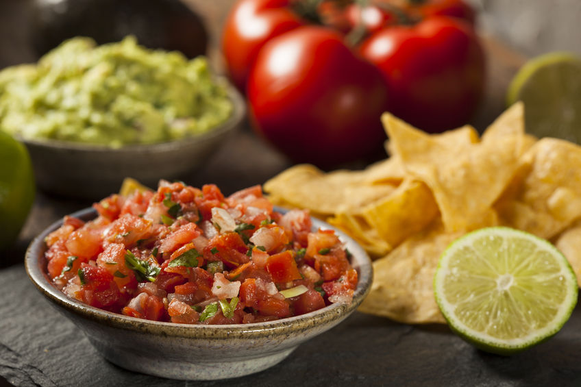 fresh salsa with lentils and chips on the side