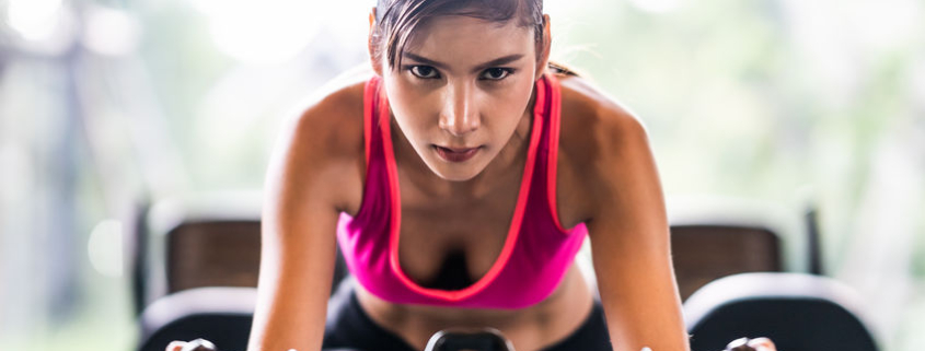 girl exercising on bike